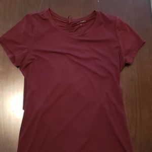 Athleta burgundy top with opening in the back
